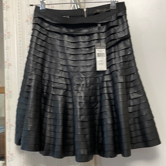 BCBGMaxAzria Dresses & Skirts - Blk pleated Pleather skirt - so pretty 😍